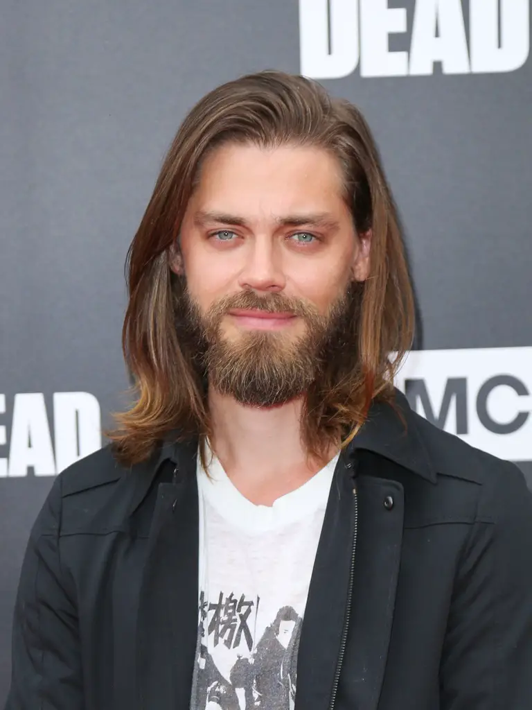 Tom Payne.